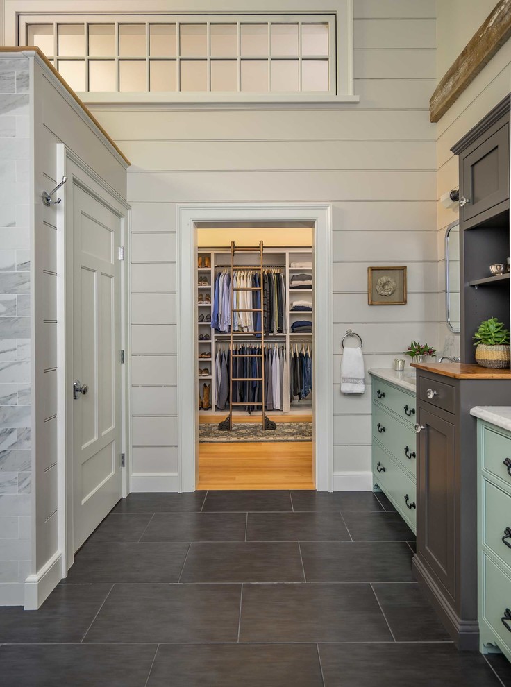 Design ideas for a mid-sized country master bathroom in Boston with furniture-like cabinets, black cabinets, a double shower, a one-piece toilet, white tile, marble, ceramic floors, an undermount sink, marble benchtops, black floor and an open shower.