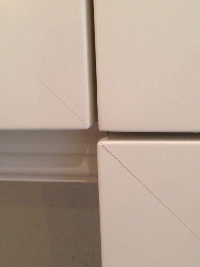 Cracks in my painted mitered flat paneled