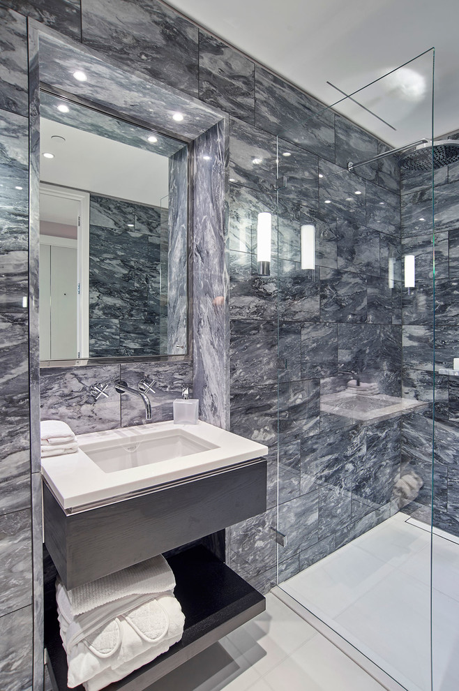 Photo of a mid-sized contemporary 3/4 bathroom in London with a curbless shower, a wall-mount toilet and a console sink.
