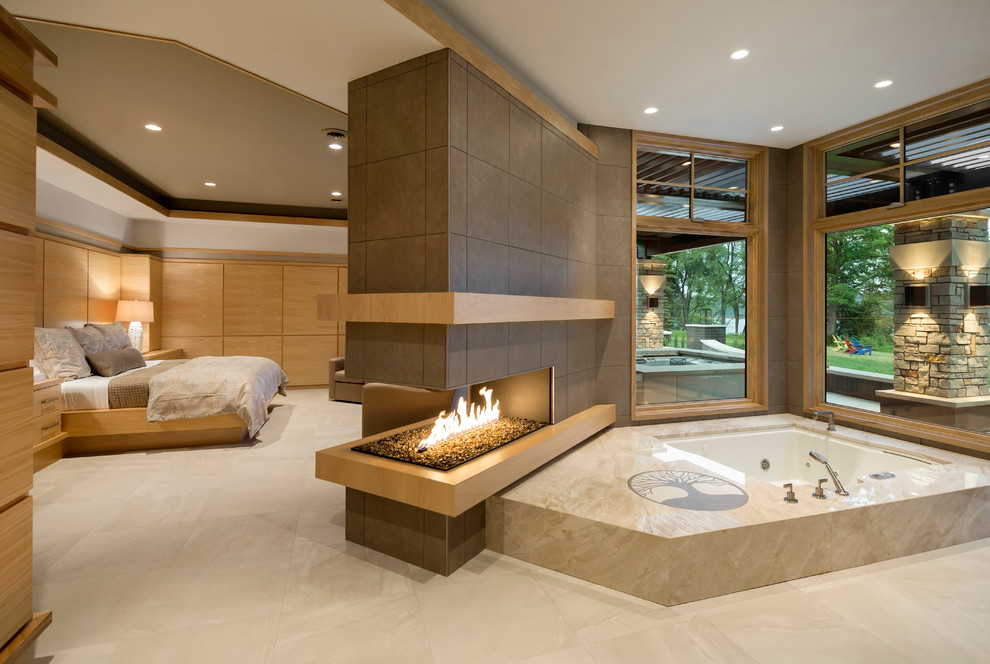 Design ideas for a large contemporary master bathroom in Minneapolis with porcelain floors and a hot tub.