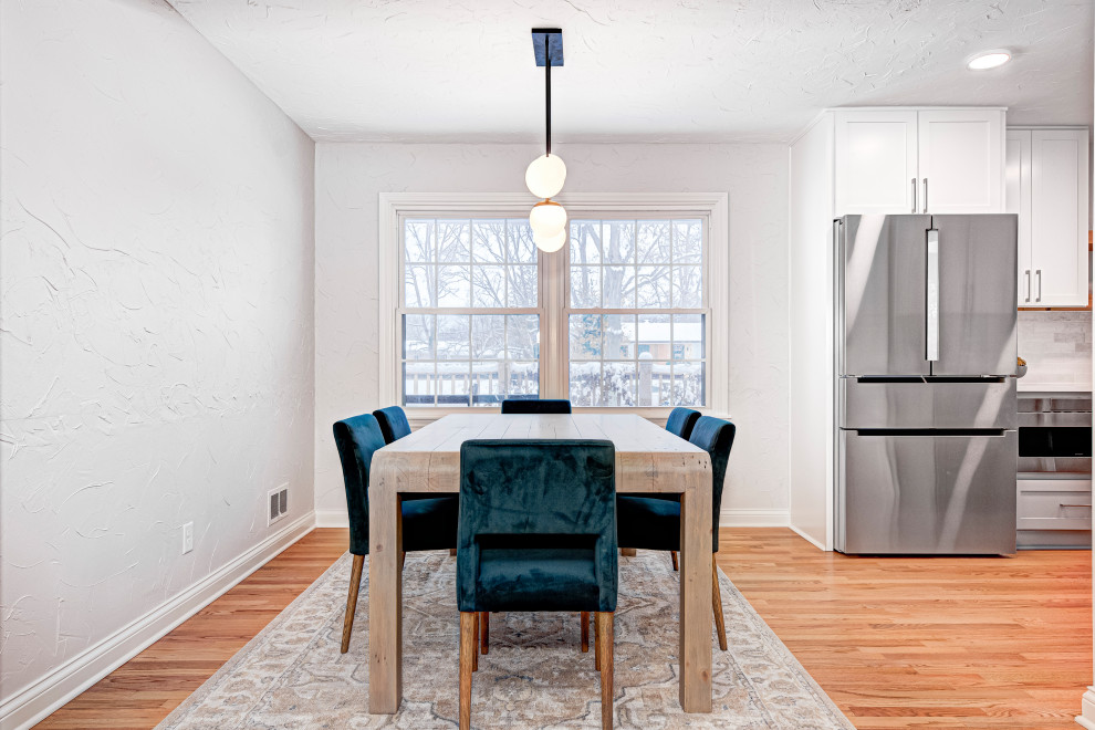 Example of a transitional dining room design in Indianapolis