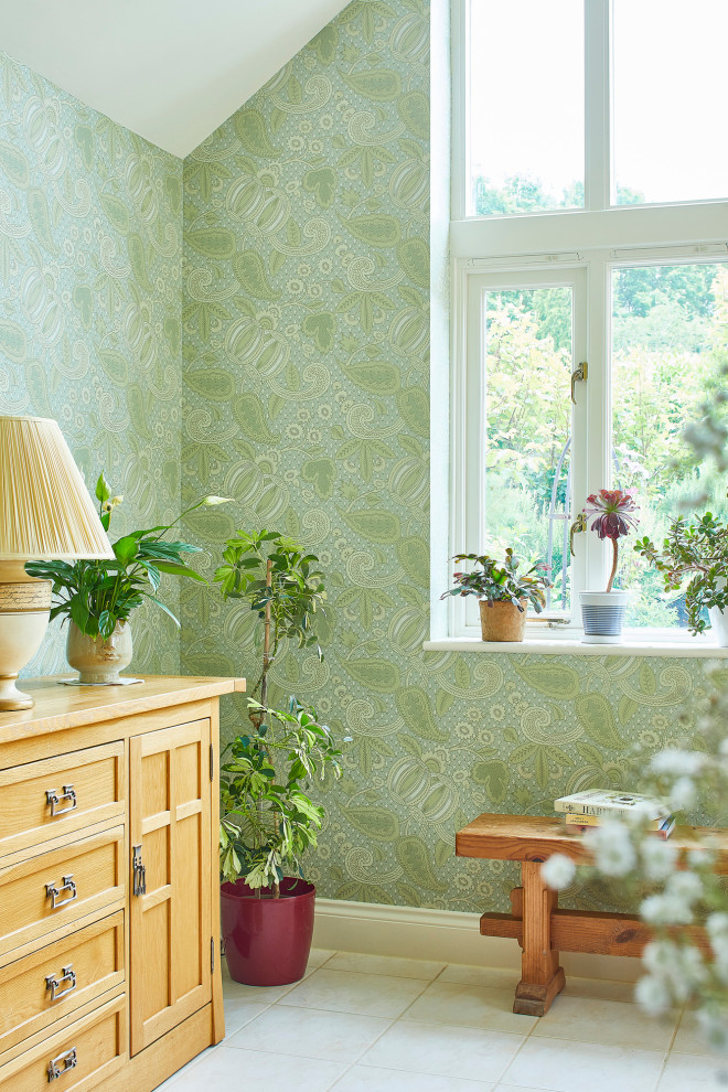 Photo of a large eclectic kitchen/dining room with green walls, porcelain flooring, beige floors, a vaulted ceiling, wallpapered walls and a feature wall.