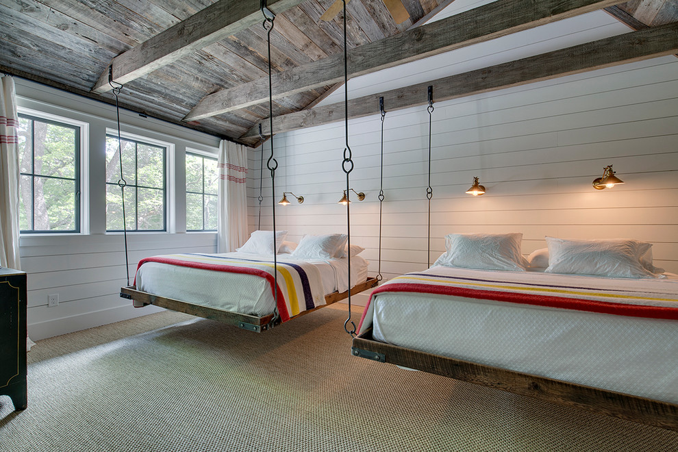 Inspiration for a country bedroom in Other with white walls and carpet.