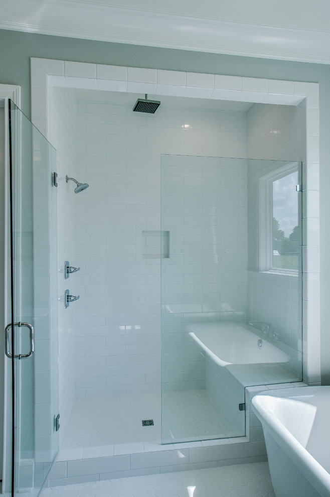 Inspiration for a mid-sized country master bathroom in Nashville with shaker cabinets, white cabinets, a freestanding tub, a curbless shower, white tile, subway tile, green walls, vinyl floors, an undermount sink and granite benchtops.