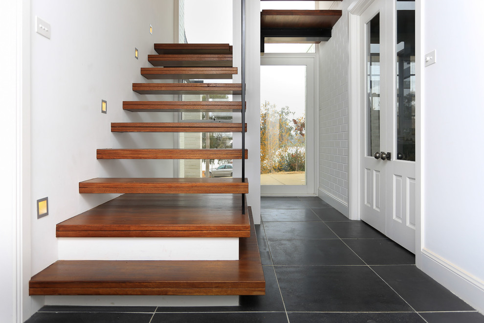 Inspiration for a transitional staircase in Other.