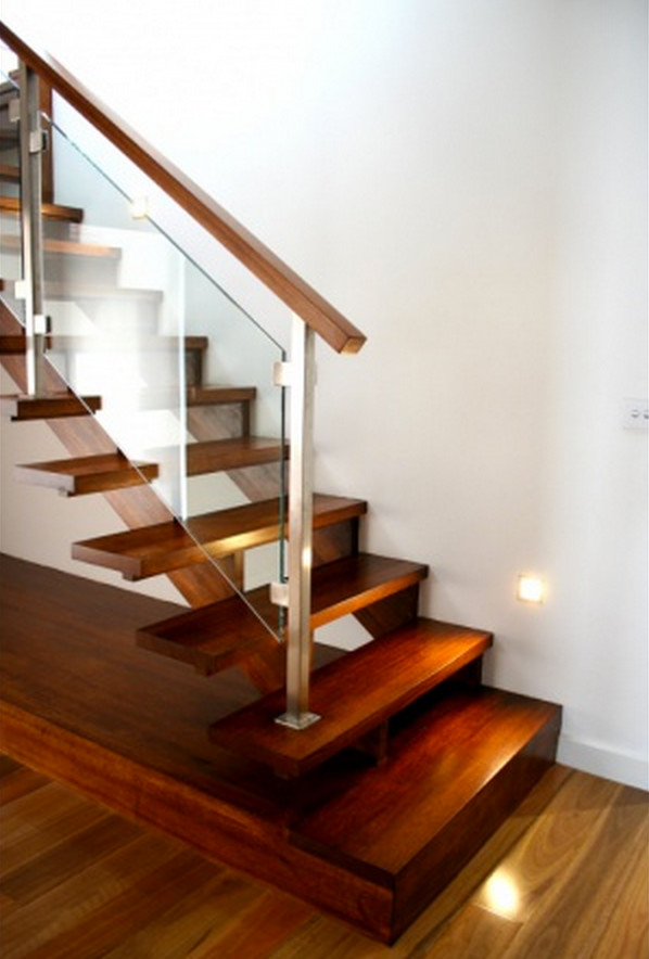 Modern wood l-shaped staircase in Melbourne with open risers.