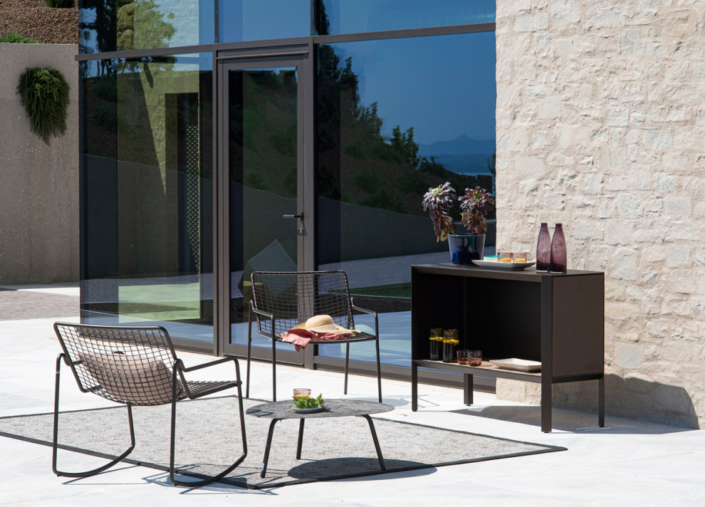 Aménagement d'une terrasse arrière contemporaine avec une cuisine d'été.