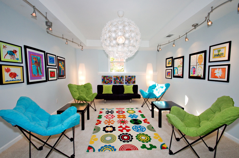 Photo of a mid-sized traditional kids' room for girls in Orange County with blue walls and carpet.