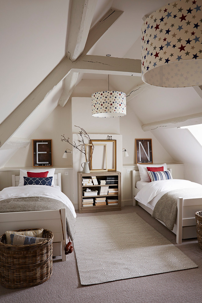 Country guest bedroom in Gloucestershire with white walls, carpet and grey floor.