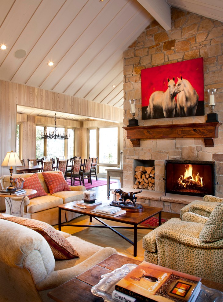 Photo of a country formal living room in Salt Lake City with a standard fireplace, a stone fireplace surround and no tv.