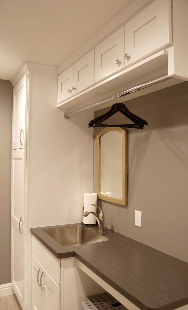 Design ideas for a traditional laundry room in Other.