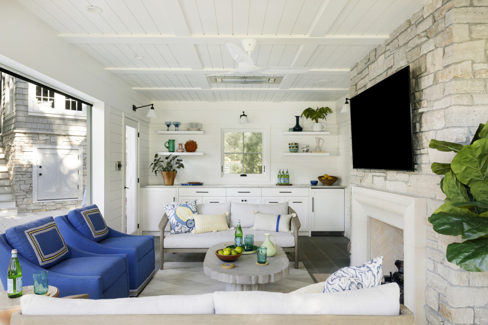 Example of a transitional backyard family room design in Minneapolis