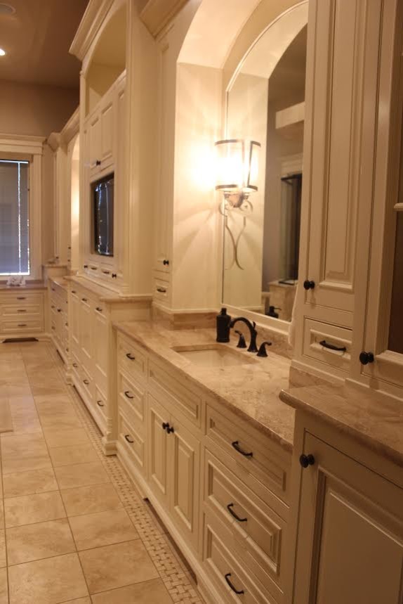 Example of a large transitional home design design