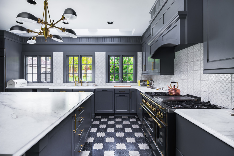 Inspiration for a large transitional l-shaped separate kitchen in New York with quartz benchtops, grey splashback, mosaic tile splashback, grey cabinets, black appliances, with island, ceramic floors, multi-coloured floor, a single-bowl sink, recessed-panel cabinets and white benchtop.