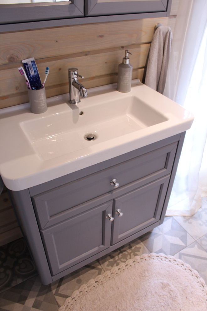 Inspiration for a mid-sized traditional 3/4 bathroom in Other with recessed-panel cabinets, grey cabinets, a corner tub, a corner shower, beige tile, porcelain tile, beige walls, porcelain floors, grey floor, a hinged shower door, white benchtops, a single vanity, a freestanding vanity, exposed beam and wood walls.