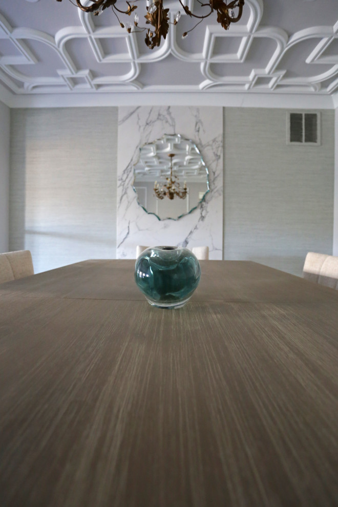 Mid-sized transitional l-shaped marble floor kitchen photo in DC Metro with an undermount sink, shaker cabinets, white cabinets, quartzite countertops, white backsplash, quartz backsplash and stainless steel appliances