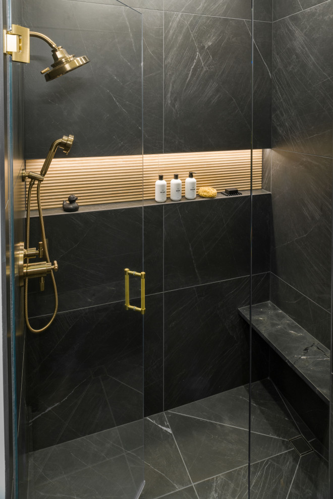 Inspiration for a small modern master black tile and porcelain tile porcelain tile, black floor and single-sink alcove shower remodel in Chicago with beaded inset cabinets, medium tone wood cabinets, a one-piece toilet, white walls, an undermount sink, quartzite countertops, a hinged shower door, black countertops and a niche