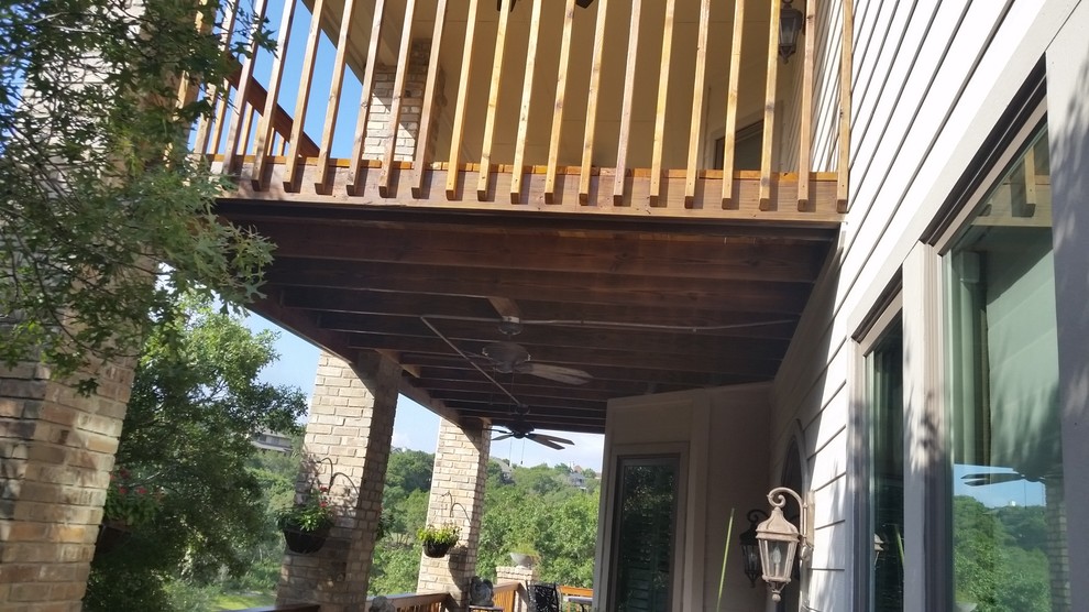 Deck - mid-sized transitional backyard deck idea in Austin with a fire pit and no cover