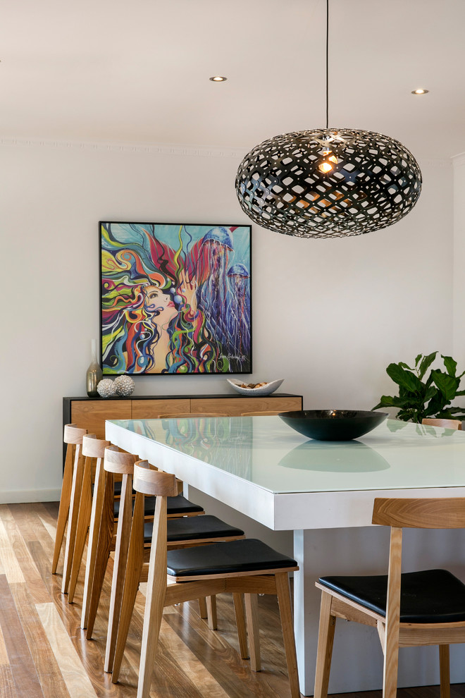 This is an example of a contemporary dining room in Adelaide.
