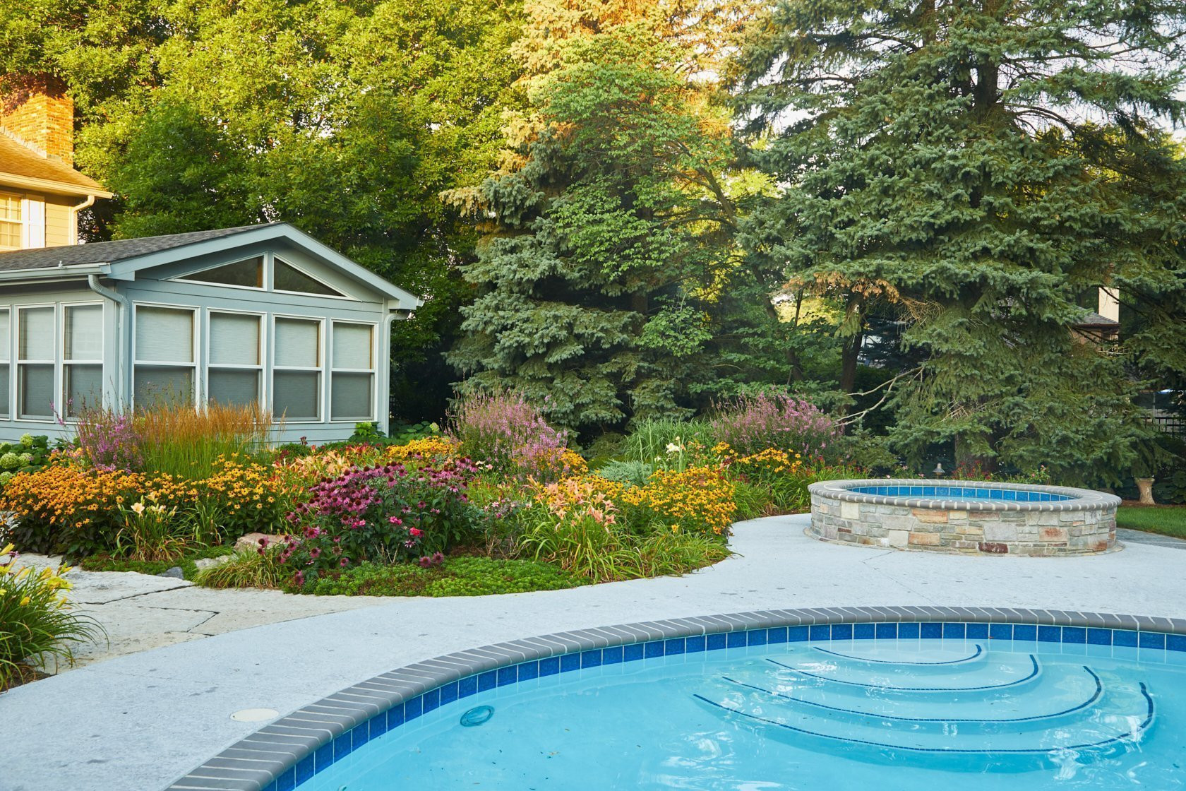 Perennial Garden at the pool. Low care, lots of color and interest. Peter Atkins and Associates, LLC