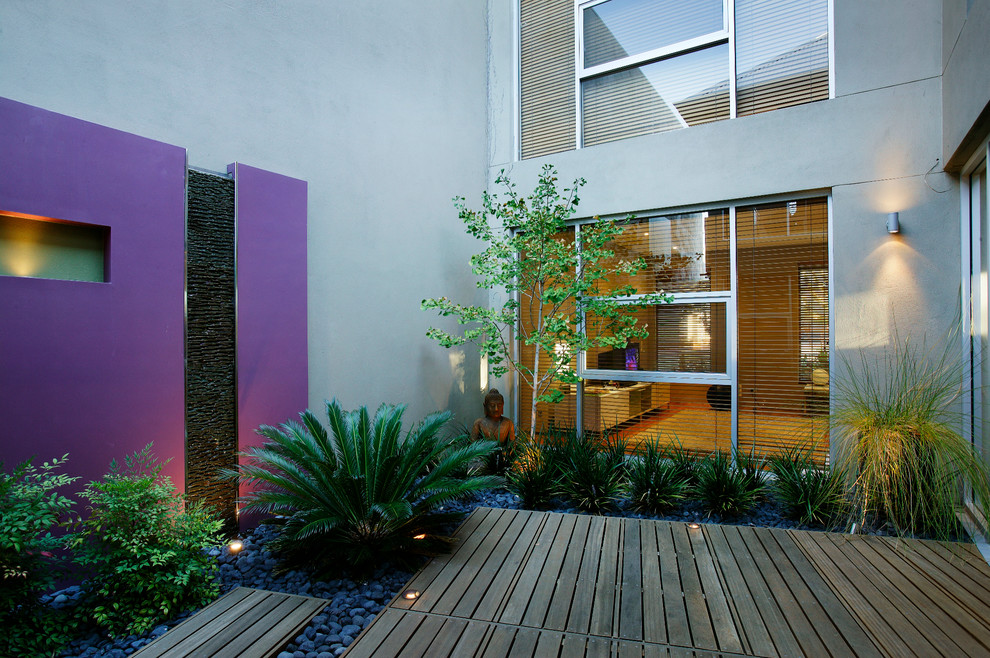 Small contemporary courtyard patio in Perth with decking.
