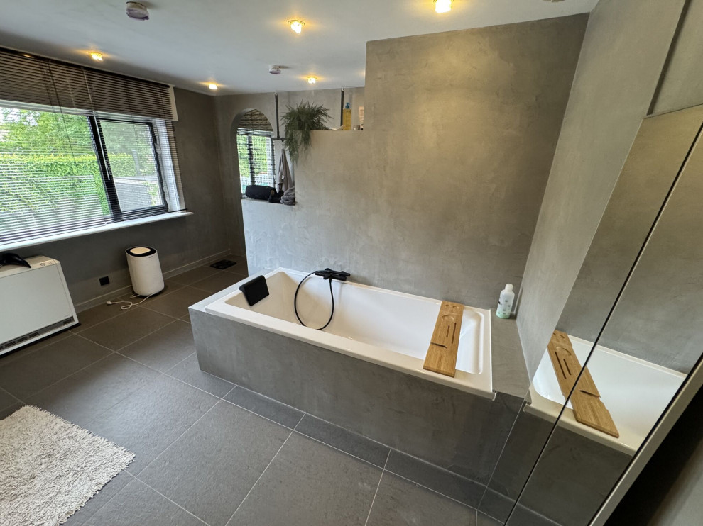 Современное решение для ванной: декоративная штукатурка под микроцемент