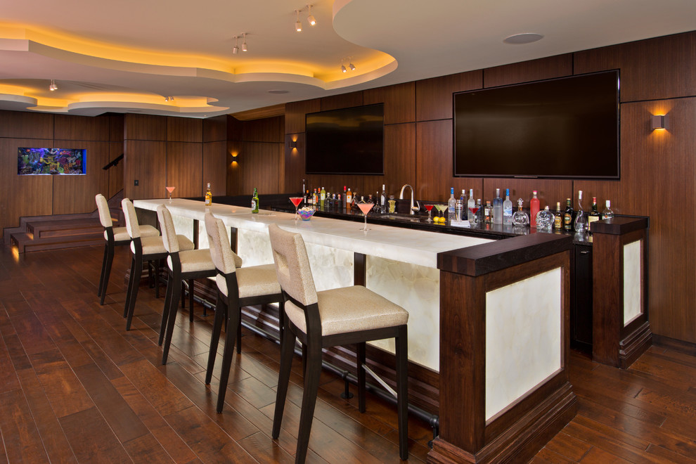 Design ideas for an expansive eclectic home bar in Boston with dark hardwood floors and brown floor.