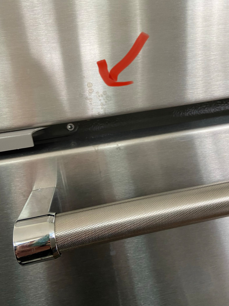 Grout cleaner stains on my stainless steel fridge!