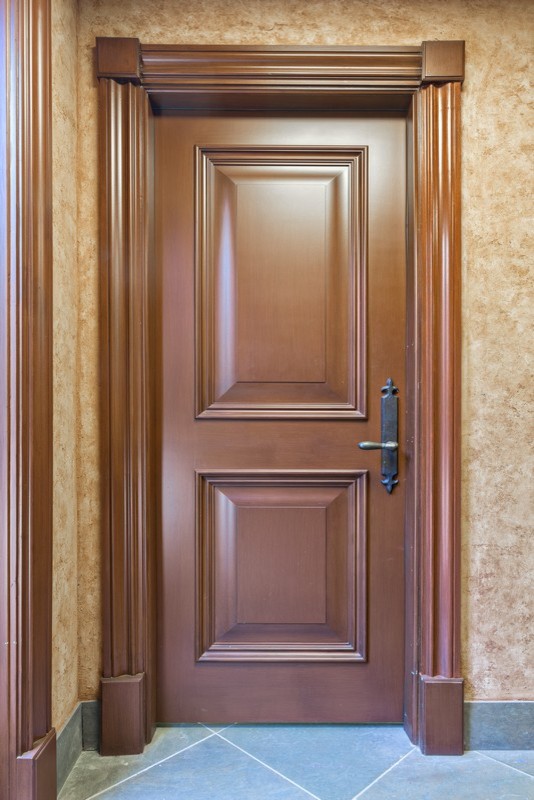 Example of a transitional wine cellar design in Denver