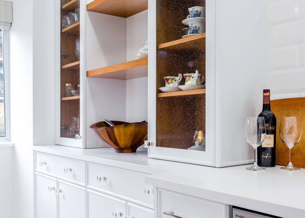 Example of a transitional kitchen design in Vancouver