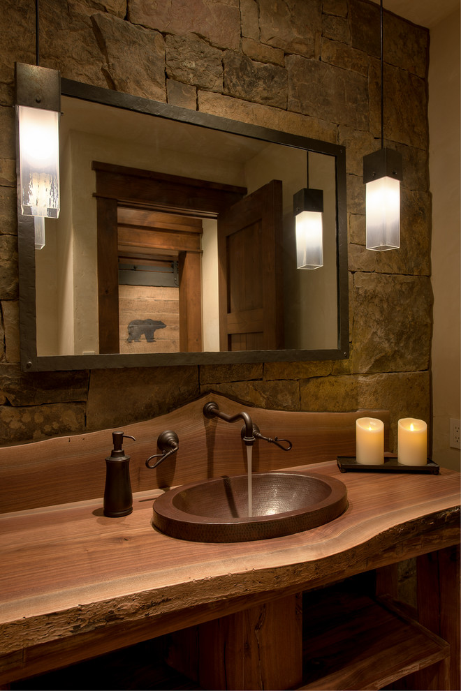 Country bathroom in Denver with wood benchtops.