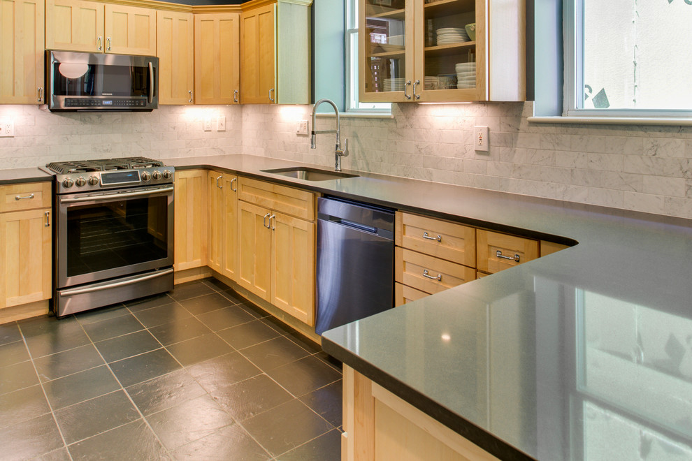 Kitchen - mid-sized transitional kitchen idea in DC Metro with recessed-panel cabinets, quartz countertops, stainless steel appliances and a peninsula