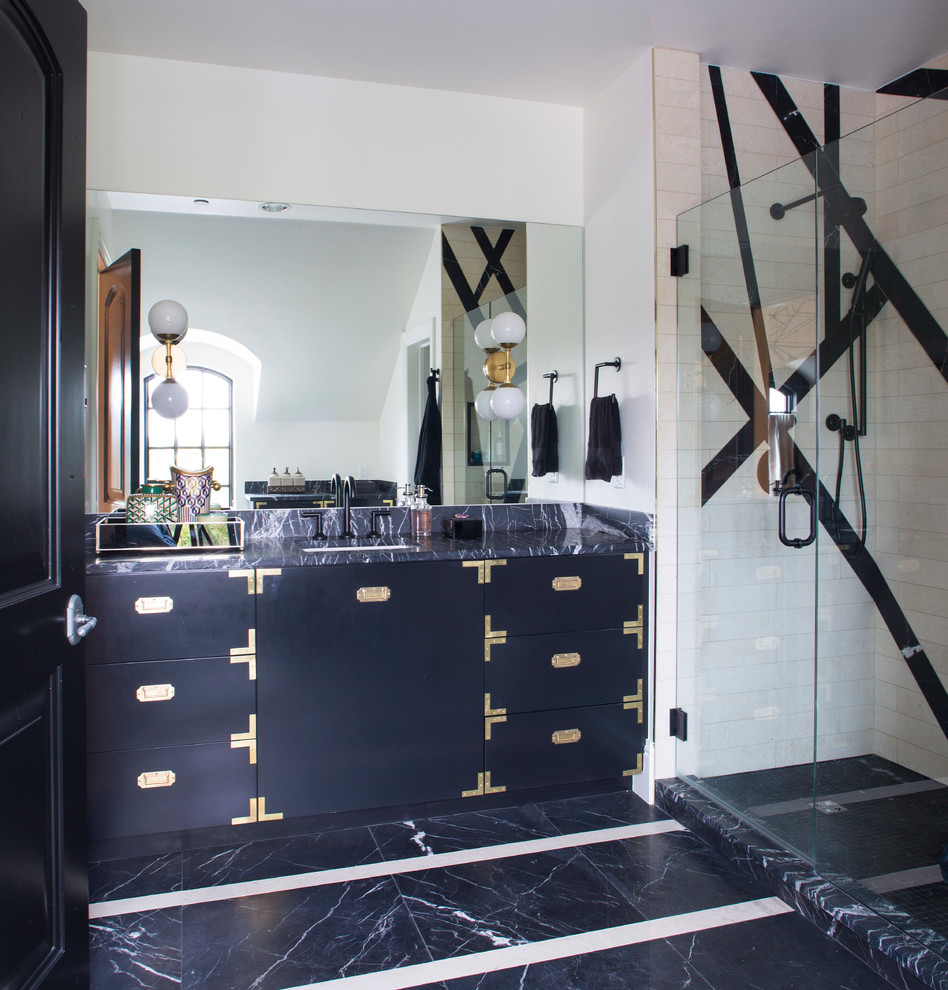 This is an example of an eclectic master bathroom in Denver with flat-panel cabinets, a corner shower, black and white tile, white tile, white walls, an undermount sink, a hinged shower door, black cabinets, marble benchtops, black floor, black benchtops, a single vanity and a built-in vanity.