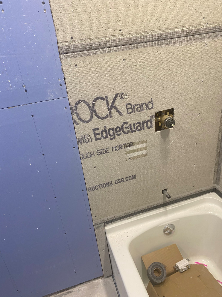 How do I finish this transition from durock to drywall?