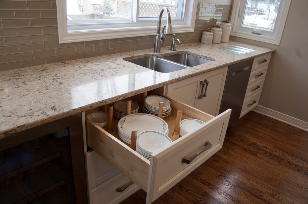 Kitchen - transitional kitchen idea in Ottawa with an island