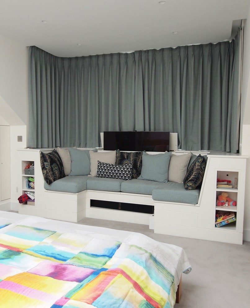 This is an example of a large contemporary master bedroom in London with white walls, carpet and grey floor.