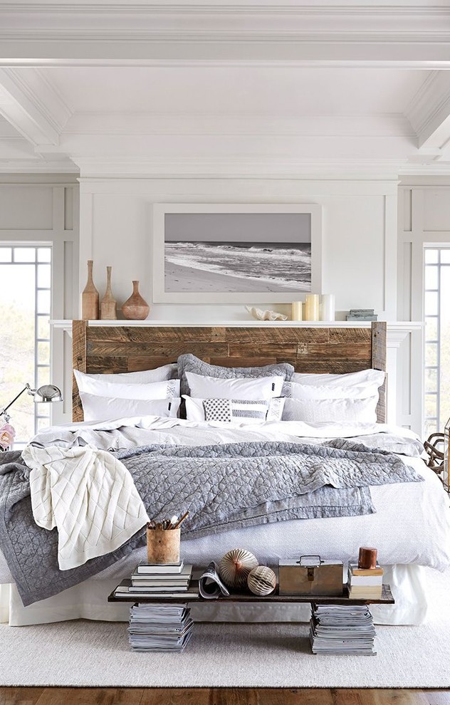 This is an example of a large beach style guest bedroom in Minneapolis with white walls.