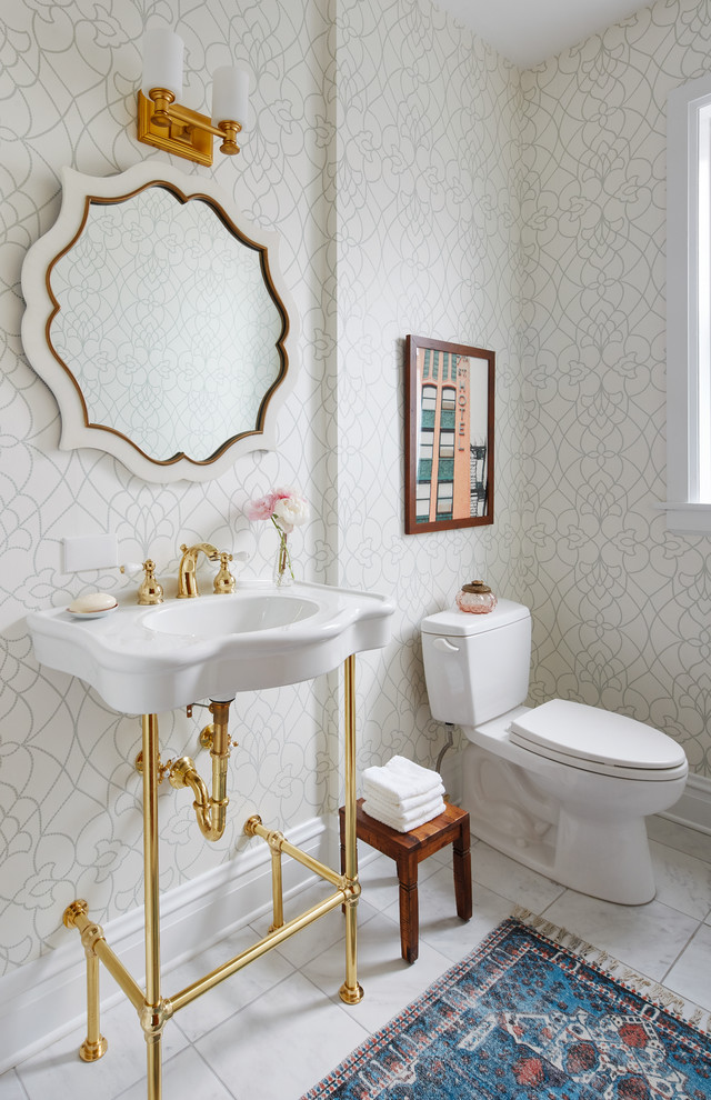 Inspiration for a small transitional powder room in Chicago with ceramic floors, white floor, a two-piece toilet, grey walls, a console sink and white benchtops.