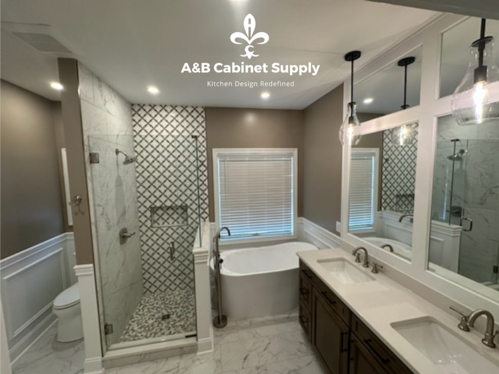 Inspiration for a mid-sized transitional master multicolored tile and cement tile cement tile floor, multicolored floor and double-sink freestanding bathtub remodel with raised-panel cabinets, medium tone wood cabinets, a two-piece toilet, beige walls, an undermount sink, quartz countertops, a hinged shower door, white countertops, a niche and a built-in vanity