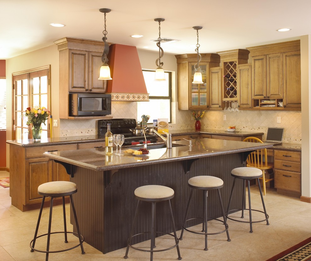 Eclectic kitchen in Phoenix with granite benchtops.