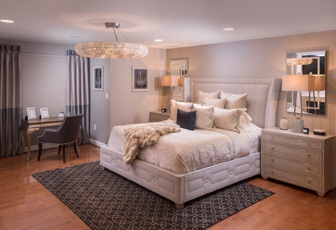 Design ideas for a medium sized classic master bedroom in Philadelphia with grey walls, medium hardwood flooring, a standard fireplace, a wooden fireplace surround, brown floors and wallpapered walls.