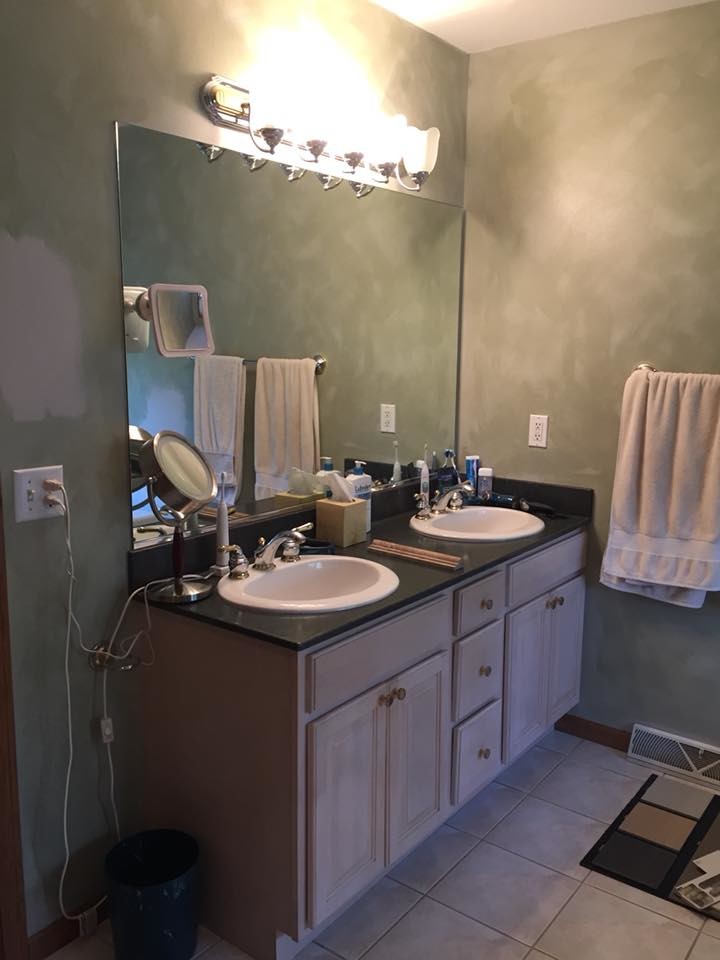 Transitional master multicolored tile and mosaic tile porcelain tile and brown floor freestanding bathtub photo with shaker cabinets, white cabinets, a vessel sink, quartz countertops, a hinged shower door and multicolored countertops