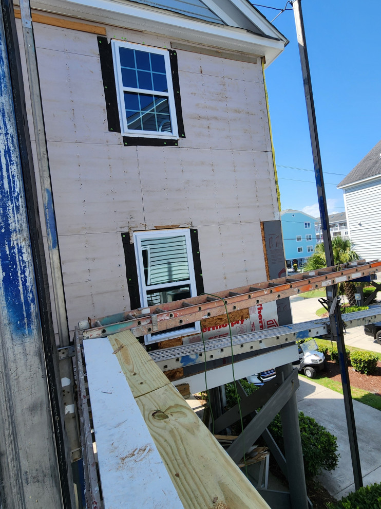 Exterior remodel / Windows / cider siding / paint