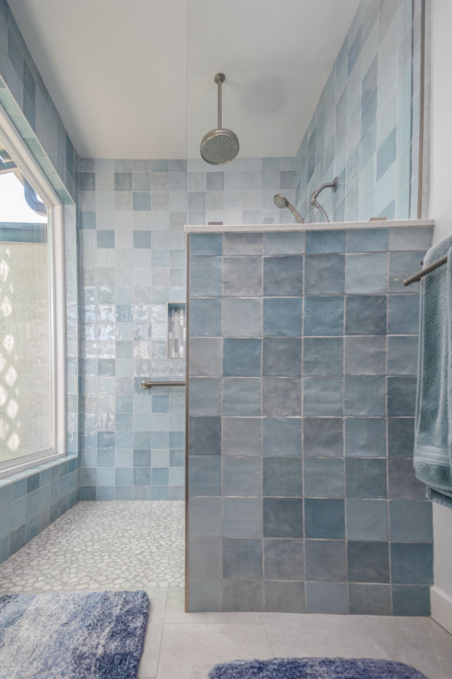 Photo of a large beach style master bathroom in San Diego with shaker cabinets, grey cabinets, an open shower, blue tile, porcelain tile, porcelain floors, an undermount sink, engineered quartz benchtops, an open shower, white benchtops, a single vanity and a built-in vanity.