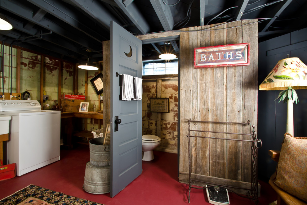 This is an example of a small eclectic bathroom in DC Metro with a two-piece toilet, grey walls and concrete floors.