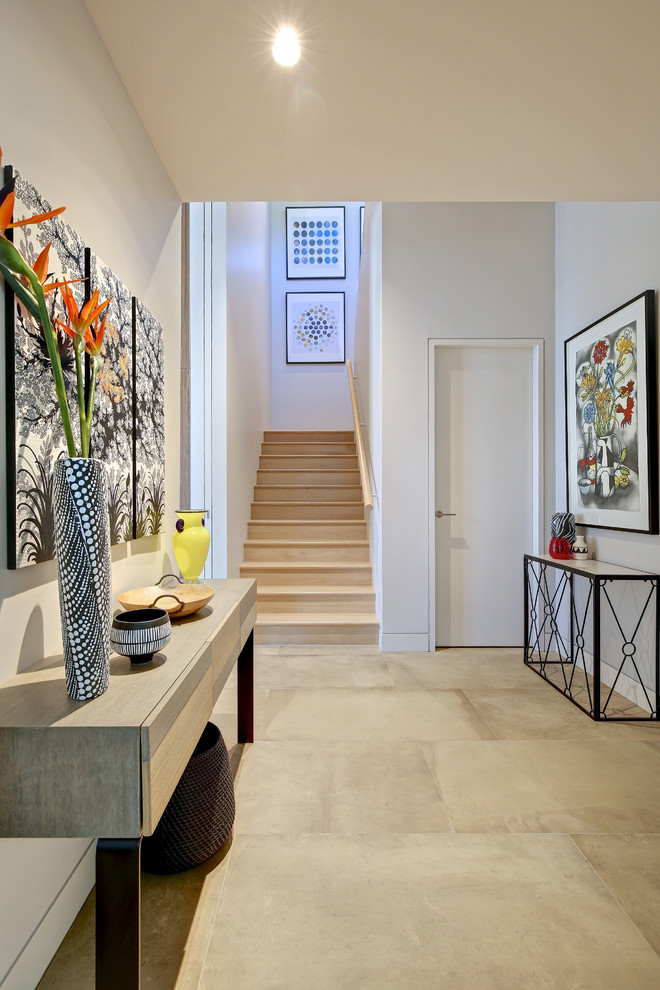 Inspiration for a large contemporary hallway in Adelaide with white walls, grey floor and porcelain floors.
