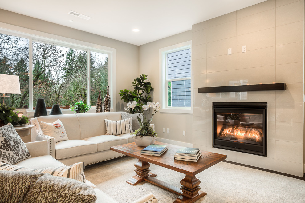 Inspiration for a transitional carpeted living room remodel in Seattle with beige walls, a ribbon fireplace and no tv
