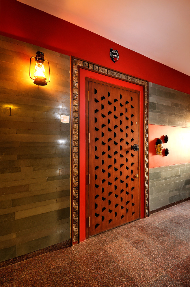 Inspiration for a contemporary entryway in Mumbai.