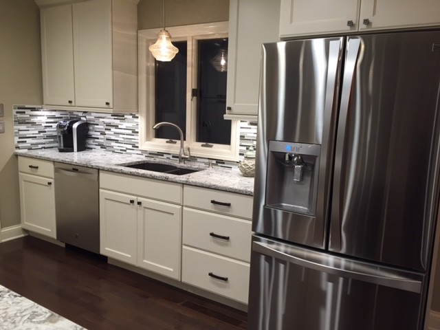 Example of a transitional kitchen design in Omaha