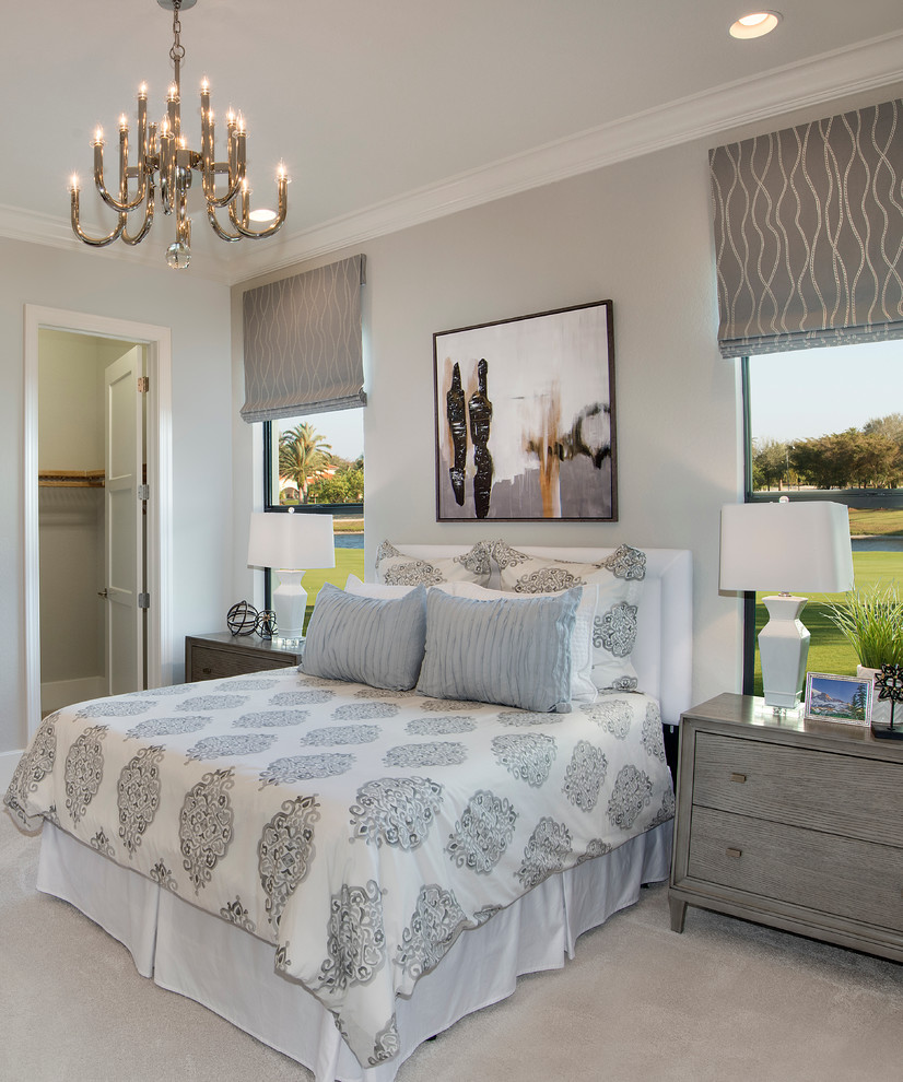 Inspiration for a transitional bedroom in Miami with grey walls and carpet.
